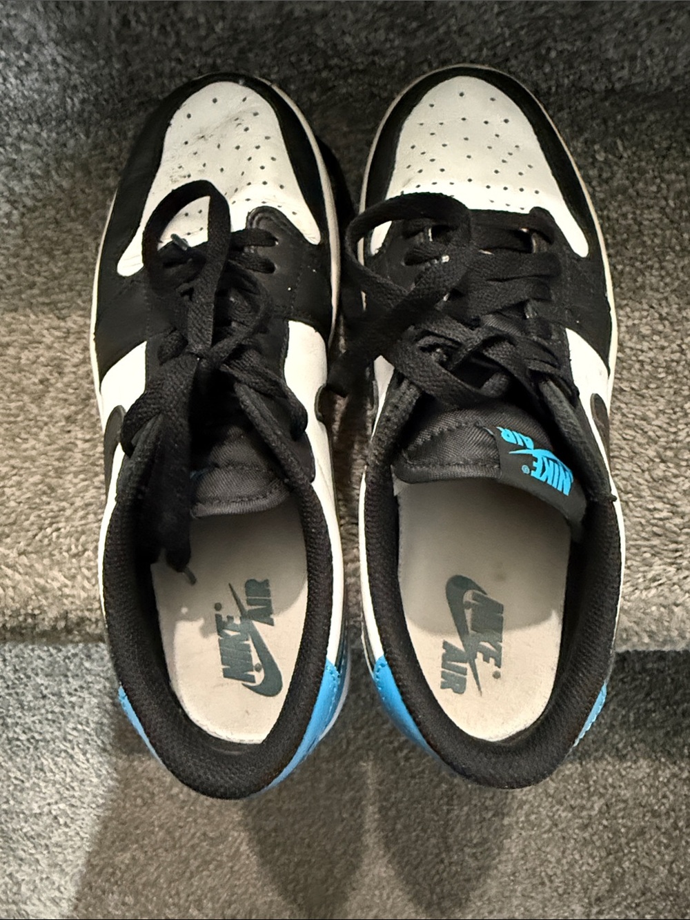 Nike Black White Low-Top Sneakers with Blue Accents